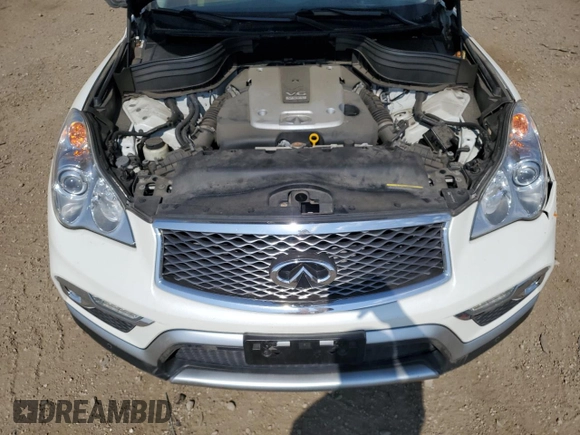 2017 Infiniti QX50 z VIN JN1BJ0RR5HM402806, wystawiony jako Copart lot #56304415 z przebiegiem 48 921 mil mil oraz Szkoda całkowita • Salvage title. Historia ofert i sprzedaży dostępna na DreamBid. Obrazek 11.