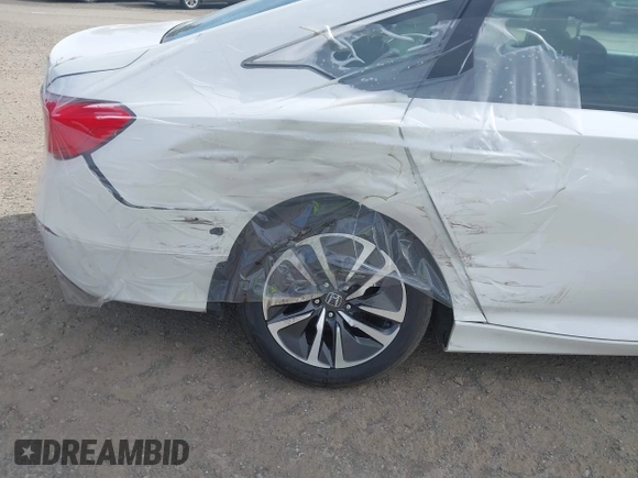 2020 Honda Accord with VIN 1HGCV3F11LA002209, listed as a IAAI auction lot 40547166 with 102,938 mi miles and . Bid and sale history available at DreamBid. Image 6.