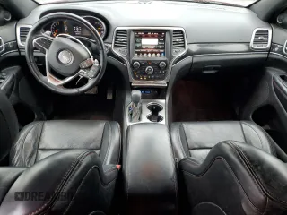 2017 Jeep Grand Cherokee Trailhawk with VIN 1C4RJFLG4HC932891, listed as a Copart auction lot 57217665 with 188,510 mi miles and Salvage title. Bid and sale history available at DreamBid. Image 8.