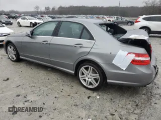 2010 Mercedes-Benz E 550 Luxury with VIN WDDHF7CB1AA106112, listed as a Copart auction lot 88675285 with 155,047 mi miles and Salvage Title. Bid and sale history available at DreamBid. Image 2.