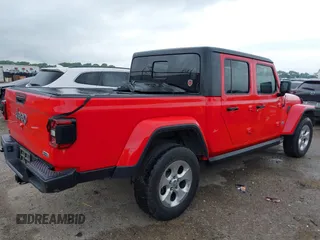 2020 Jeep Gladiator Overland with VIN 1C6HJTFG2LL136758, listed as a IAAI auction lot 42414592 with 57,279 mi miles and . Bid and sale history available at DreamBid. Image 4.
