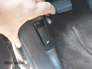 1996 Cadillac Fleetwood z VIN 1G6DW52PXTR713787, wystawiony jako IAAI lot #42079864 z przebiegiem Nie podano mil oraz . Historia ofert i sprzedaży dostępna na DreamBid. Obrazek 6.