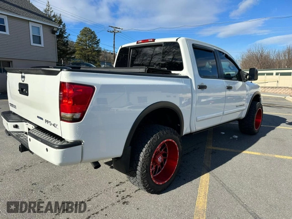 2015 Nissan Titan SL with VIN 1N6BA0EC7FN509763, listed as a Copart auction lot 88064785 with 168,916 mi miles and Clean Title. Bid and sale history available at carsss.com. Image 3.