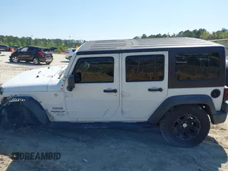 2015 Jeep Wrangler Unlimited Willys Wheeler with VIN 1C4BJWDG0FL546000, listed as a IAAI auction lot 41984566 with 112,742 mi miles and . Bid and sale history available at DreamBid. Image 14.