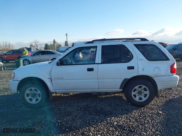 2001 Isuzu Rodeo S with VIN 4S2DM58W014335513, listed as a IAAI auction lot 41529329 with NaN miles. Bid and sale history available at carsss.com. Image 15.