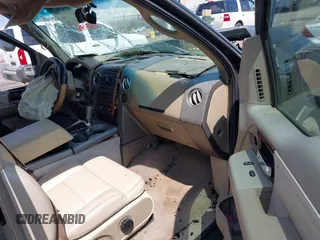 2004 Ford F-150 XL with VIN 1FTPX12514NB25784, listed as a IAAI auction lot 42107868 with 371,297 mi miles and . Bid and sale history available at DreamBid. Image 5.