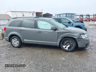 2019 Dodge Journey SE with VIN 3C4PDCBB2KT804440, listed as a IAAI auction lot 41333876 with 72,209 mi miles and . Bid and sale history available at DreamBid. Image 13.
