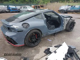 2024 Nissan Z Nismo with VIN JN1BZ4CH9RM360447, listed as a IAAI auction lot 42457597 with 9,723 mi miles and . Bid and sale history available at DreamBid. Image 4.