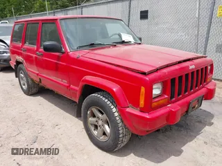 1998 Jeep Cherokee Sport z VIN 1J4FJ68SXWL140459, wystawiony jako IAAI lot #42417945 z przebiegiem 186 428 mil mil oraz . Historia ofert i sprzedaży dostępna na DreamBid. Obrazek 1.