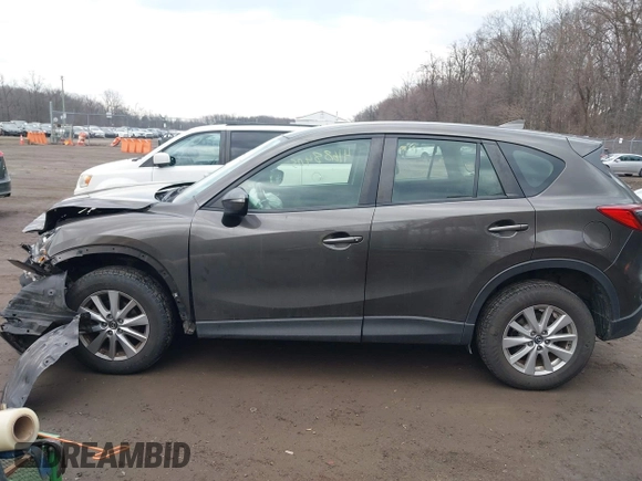 2016 Mazda CX-5 Sport with VIN JM3KE4BY8G0895209, listed as a IAAI auction lot 41688405 with 115,954 mi miles. Bid and sale history available at carsss.com. Image 14.