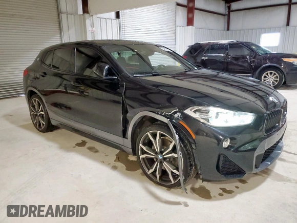 2018 BMW X2 sDrive28i with VIN WBXYJ3C37JEJ81760, listed as a Copart auction lot 54973475 with 64,000 mi miles and Clean title. Bid and sale history available at DreamBid. Image 4.