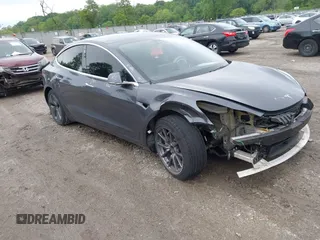 2019 Tesla Model 3 Mid Range z VIN 5YJ3E1EA9KF362435, wystawiony jako IAAI lot #42269446 z przebiegiem 61 445 mil mil oraz . Historia ofert i sprzedaży dostępna na DreamBid. Obrazek 1.