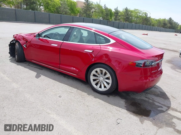2018 Tesla Model S 75D with VIN 5YJSA1E29JF273494, listed as a IAAI auction lot 42246104 with 93,870 mi miles and . Bid and sale history available at DreamBid. Image 3.