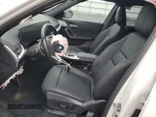 2023 BMW X1 xDrive28i z VIN WBX73EF06P5W06767, wystawiony jako Copart lot #51383755 z przebiegiem 25 605 mil mil oraz Szkody całkowita. Historia ofert i sprzedaży dostępna na DreamBid. Obrazek 7.