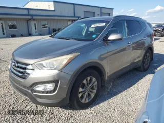 2014 Hyundai Santa Fe with VIN 5XYZU3LB4EG173287, listed as a Copart auction lot 63034625 with 185,058 mi miles and Clean title. Bid and sale history available at DreamBid. Image 1.