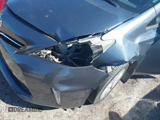 2014 Toyota Prius Two z VIN JTDZN3EU2E3293170, wystawiony jako IAAI lot #41721493 z przebiegiem 186 801 mil mil oraz . Historia ofert i sprzedaży dostępna na DreamBid. Obrazek 6.