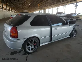 1996 Honda Civic DX with VIN 2HGEJ634XTH105568, listed as a Copart auction lot 69697714 with 130,880 mi miles and Salvage Title. Bid and sale history available at carsss.com. Image 3.