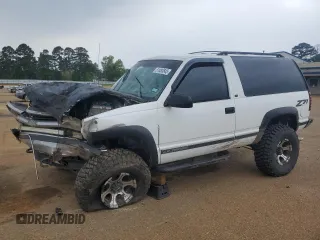 1998 Chevrolet Tahoe z VIN 3GNEK18R0WG147603, wystawiony jako Copart lot #51483845 z przebiegiem 187 582 mil mil oraz Szkoda całkowita • Salvage title. Historia ofert i sprzedaży dostępna na DreamBid. Obrazek 1.