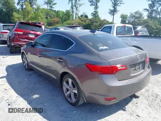 2014 Acura ILX Technology with VIN 19VDE1F73EE013345, listed as a IAAI auction lot 40193022 with 102,265 mi miles and . Bid and sale history available at DreamBid. Image 3.