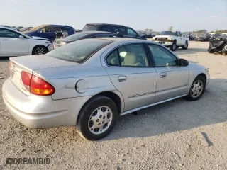 2004 Oldsmobile Alero GX with VIN 1G3NK52F94C146979, listed as a Copart auction lot 69420344 with 101,408 mi miles and Salvage Title. Bid and sale history available at carsss.com. Image 3.