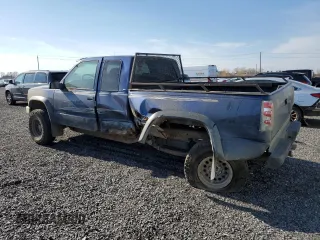 1995 GMC Sierra 1500 z VIN 2GTEK19K3S1591653, wystawiony jako Copart lot #75799124 z przebiegiem 329 311 mil mil oraz Nie do naprawy. Historia ofert i sprzedaży dostępna na DreamBid. Obrazek 2.