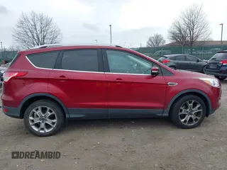 2016 Ford Escape Titanium with VIN 1FMCU9J92GUB13000, listed as a IAAI auction lot 41725258 with 66,817 mi miles. Bid and sale history available at carsss.com. Image 12.