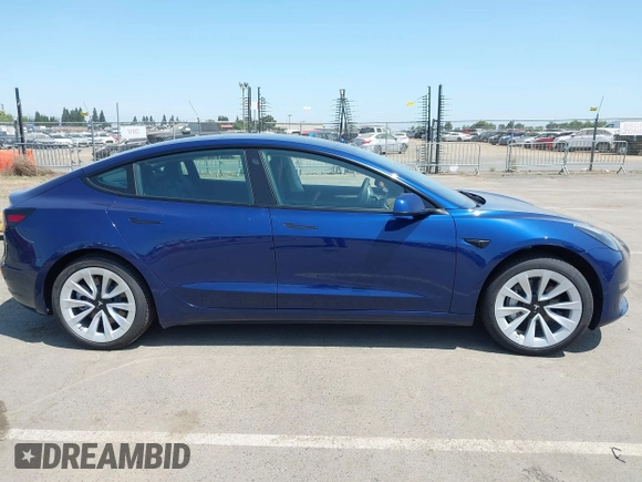 2023 Tesla Model 3 z VIN 5YJ3E1EA6PF547209, wystawiony jako IAAI lot #42511077 z przebiegiem 6 125 mil mil oraz . Historia ofert i sprzedaży dostępna na DreamBid. Obrazek 13.