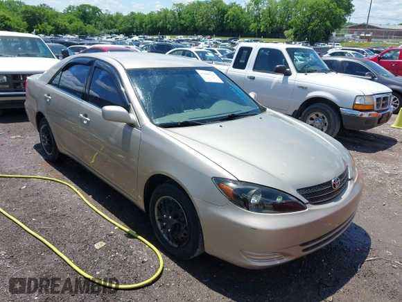 2002 Toyota Camry LE z VIN 4T1BE32K42U592181, wystawiony jako IAAI lot #42206721 z przebiegiem 299 947 mil mil oraz . Historia ofert i sprzedaży dostępna na DreamBid. Obrazek 1.