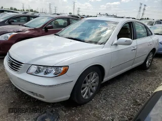 2009 Hyundai Azera Limited with VIN KMHFC46F99A370581, listed as a Copart auction lot 63080005 with 86,882 mi miles and Salvage title. Bid and sale history available at DreamBid. Image 1.