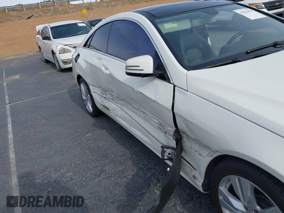 2012 Mercedes-Benz E 350 with VIN WDDKJ5KBXCF133020, listed as a IAAI auction lot 41023858 with 144,330 mi miles and . Bid and sale history available at DreamBid. Image 6.