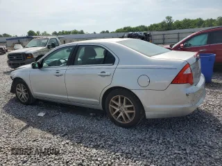 2012 Ford Fusion SEL with VIN 3FAHP0JG9CR157630, listed as a Copart auction lot 61682695 with 154,281 mi miles and Salvage title. Bid and sale history available at DreamBid. Image 2.