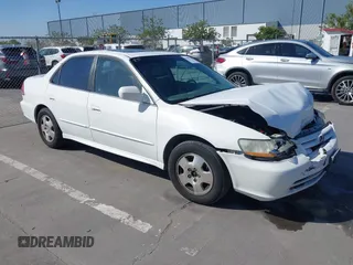 2001 Honda Accord EX z VIN 1HGCG16501A074615, wystawiony jako IAAI lot #42297708 z przebiegiem 187 936 mil mil oraz . Historia ofert i sprzedaży dostępna na DreamBid. Obrazek 1.