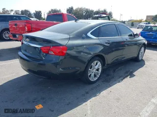 2014 Chevrolet Impala LT with VIN 1G1115SL5EU117684, listed as a IAAI auction lot 42043542 with 105,385 mi miles. Bid and sale history available at carsss.com. Image 4.