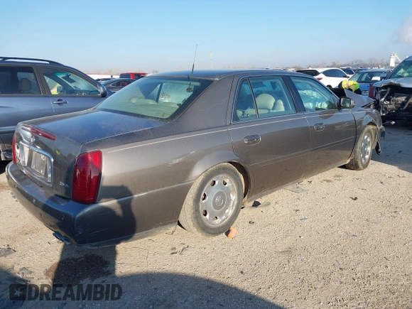 2002 Cadillac DeVille DHS z VIN 1G6KE57Y52U283531, wystawiony jako IAAI lot #41640930 z przebiegiem 94 435 mil mil oraz . Historia ofert i sprzedaży dostępna na DreamBid. Obrazek 4.