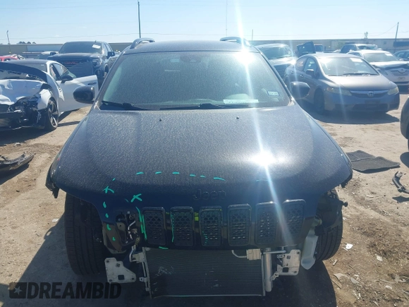 2021 Jeep Cherokee Altitude with VIN 1C4PJLLBXMD112667, listed as a IAAI auction lot 41959004 with 25,524 mi miles and . Bid and sale history available at DreamBid. Image 13.
