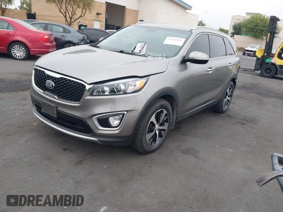 2018 Kia Sorento EX with VIN 5XYPH4A59JG394960, listed as a IAAI auction lot 42342621 with 158,056 mi miles and . Bid and sale history available at DreamBid. Image 2.