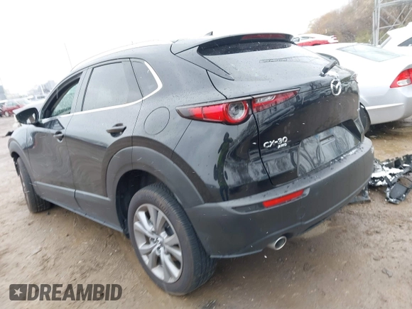 2023 Mazda CX-30 2.5 S Premium Package with VIN 3MVDMBDM3PM559627, listed as a IAAI auction lot 40910485 with 8,365 mi miles. Bid and sale history available at carsss.com. Image 3.