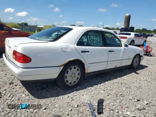 1999 Mercedes-Benz E-Class with VIN WDBJF65H0XA877630, listed as a Copart auction lot 69697454 with 0 mi miles and Salvage Title. Bid and sale history available at carsss.com. Image 3.