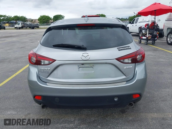2014 Mazda 3 i Grand Touring with VIN JM1BM1M73E1216596, listed as a IAAI auction lot 41621165 with 127,235 mi miles and . Bid and sale history available at DreamBid. Image 16.