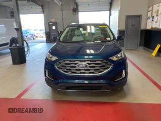 2020 Ford Edge Titanium z VIN 2FMPK3K91LBB37761, wystawiony jako IAAI lot #42829390 z przebiegiem 90 117 mil mil oraz . Historia ofert i sprzedaży dostępna na DreamBid. Obrazek 4.