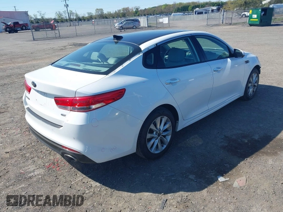 2016 Kia Optima EX with VIN 5XXGU4L35GG098080, listed as a IAAI auction lot 41994612 with 86,646 mi miles and . Bid and sale history available at carsss.com. Image 4.