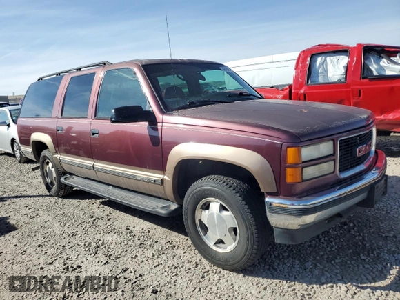 1997 GMC Suburban z VIN 1GKFK16R0VJ739603, wystawiony jako Copart lot #48430045 z przebiegiem 195 017 mil mil oraz Szkoda całkowita • Salvage title. Historia ofert i sprzedaży dostępna na DreamBid. Obrazek 4.