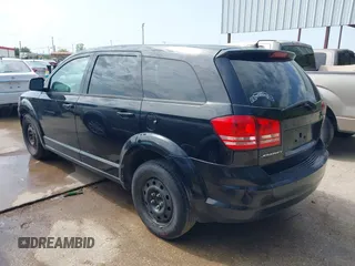 2014 Dodge Journey SE with VIN 3C4PDCABXET235827, listed as a IAAI auction lot 41927966 with 186,179 mi miles and . Bid and sale history available at carsss.com. Image 3.