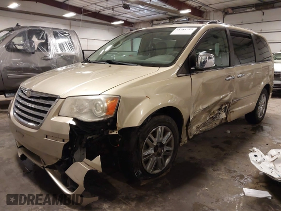2010 Chrysler Town & Country Limited with VIN 2A4RR7DX5AR386462, listed as a IAAI auction lot 41781713 with 183,091 mi miles and . Bid and sale history available at carsss.com. Image 2.