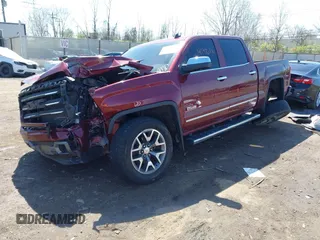 2014 GMC Sierra 1500 SLT with VIN 3GTU2VECXEG485827, listed as a IAAI auction lot 41976816 with 157,200 mi miles and . Bid and sale history available at DreamBid. Image 2.