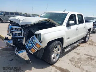 2014 Chevrolet Silverado 1500 LT with VIN 3GCPCREC7EG357921, listed as a IAAI auction lot 41827205 with 130,861 mi miles. Bid and sale history available at carsss.com. Image 2.