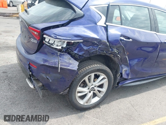 2018 Infiniti QX30 Luxury with VIN SJKCH5CP2JA056994, listed as a IAAI auction lot 42429273 with 48,048 mi miles and . Bid and sale history available at DreamBid. Image 6.