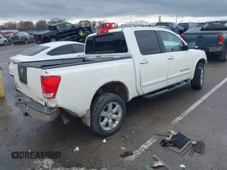 2012 Nissan Titan SL with VIN 1N6AA0EC7CN311109, listed as a IAAI auction lot 41420110 with 209,731 mi miles and . Bid and sale history available at DreamBid. Image 4.