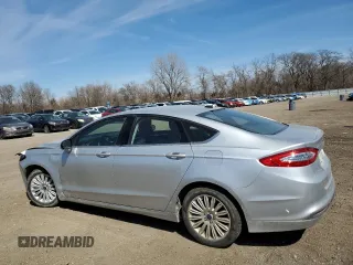 2016 Ford Fusion SE Hybrid with VIN 3FA6P0LU4GR352115, listed as a Copart auction lot 50616775 with 86,579 mi miles and Salvage title. Bid and sale history available at DreamBid. Image 2.