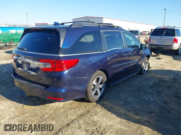 2020 Honda Odyssey Touring with VIN 5FNRL6H89LB015744, listed as a IAAI auction lot 41495735 with 106,440 mi miles and . Bid and sale history available at DreamBid. Image 4.